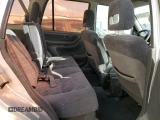 1999 Honda CR-V LX with VIN JHLRD2848XC011581, listed as a Copart auction lot 77183294 with 218,474 mi miles and Salvage Title. Bid and sale history available at carsss.com. Image 11.