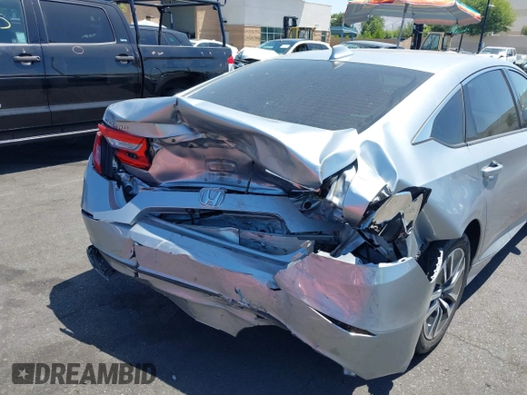 2020 Honda Accord with VIN 1HGCV3F11LA002534, listed as a IAAI auction lot 42537701 with 115,166 mi miles and . Bid and sale history available at DreamBid. Image 6.