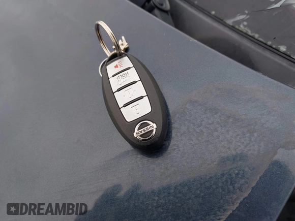 2015 Nissan Rogue SL z VIN 5N1AT2MVXFC853005, wystawiony jako IAAI lot #41480177 z przebiegiem Nie podano mil oraz . Historia ofert i sprzedaży dostępna na DreamBid. Obrazek 11.