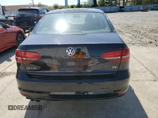 2017 Volkswagen Jetta S z VIN 3VW2B7AJXHM319558, wystawiony jako Copart lot #54708105 z przebiegiem 108 476 mil mil oraz Czysty tytuł • Clean title. Historia ofert i sprzedaży dostępna na DreamBid. Obrazek 6.