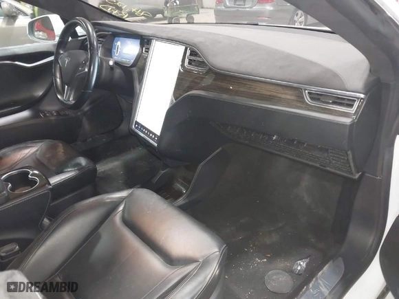 2016 Tesla Model S 90D with VIN 5YJSA1E44GF131208, listed as a IAAI auction lot 42060513 with 84,125 mi miles. Bid and sale history available at carsss.com. Image 5.