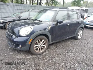 2011 MINI Countryman S z VIN WMWZC3C55BWL79422, wystawiony jako IAAI lot #42466982 z przebiegiem 104 392 mil mil oraz . Historia ofert i sprzedaży dostępna na DreamBid. Obrazek 2.