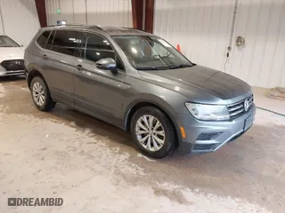 2018 Volkswagen Tiguan S with VIN 3VV1B7AX7JM106531, listed as a IAAI auction lot 41668403 with 119,885 mi miles. Bid and sale history available at carsss.com. Image 1.