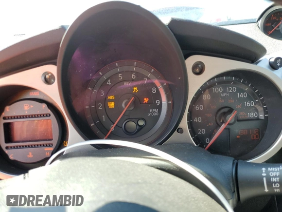 2013 Nissan 370Z z VIN JN1AZ4EH4DM383023, wystawiony jako Copart lot #88204985 z przebiegiem 138 112 mil mil oraz Szkoda całkowita • Salvage title. Historia ofert i sprzedaży dostępna na DreamBid. Obrazek 9.