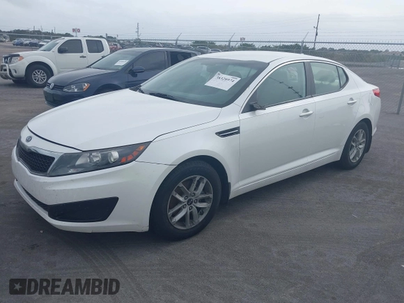 2011 Kia Optima LX with VIN KNAGM4A70B5065293, listed as a IAAI auction lot 38328974 with 224,554 mi miles and . Bid and sale history available at carsss.com. Image 2.