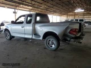 2003 Ford F-150 XL with VIN 1FTRX07233KD43811, listed as a Copart auction lot 85113414 with 215,390 mi miles and Salvage Title. Bid and sale history available at carsss.com. Image 2.