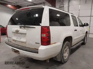 2008 Chevrolet Suburban Commercial with VIN 1GNFK16348J196002, listed as a IAAI auction lot 41378119 with 287,078 mi miles. Bid and sale history available at carsss.com. Image 4.