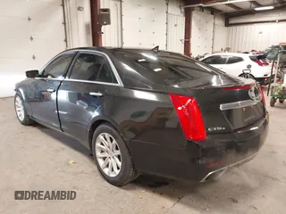 2014 Cadillac CTS Luxury AWD with VIN 1G6AX5S36E0173682, listed as a IAAI auction lot 41538709 with 102,772 mi miles and . Bid and sale history available at DreamBid. Image 3.