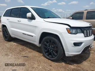 2019 Jeep Grand Cherokee Altitude with VIN 1C4RJEAG5KC542855, listed as a IAAI auction lot 42388896 with 100,269 mi miles and . Bid and sale history available at DreamBid. Image 1.