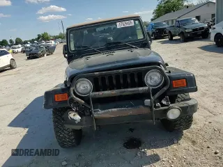 2001 Jeep Wrangler Sahara with VIN 1J4FA59S71P343366, listed as a Copart auction lot 57826405 with 156,436 mi miles and Salvage title. Bid and sale history available at DreamBid. Image 13.