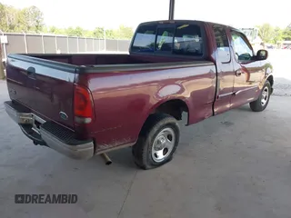 1999 Ford F-150 z VIN 1FTZX1721XNA79241, wystawiony jako IAAI lot #42186220 z przebiegiem Nie podano mil oraz . Historia ofert i sprzedaży dostępna na DreamBid. Obrazek 4.