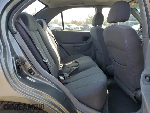 2005 Hyundai Accent GLS with VIN KMHCG45C65U625887, listed as a Copart auction lot 48824225 with 110,594 mi miles and Salvage Title. Bid and sale history available at carsss.com. Image 10.