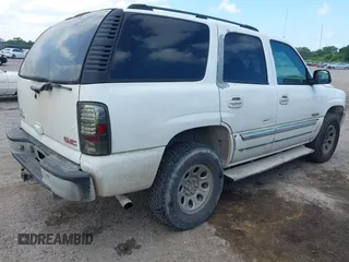 2003 GMC Yukon SLT z VIN 1GKEC13V43R278155, wystawiony jako IAAI lot #42296404 z przebiegiem 333 477 mil mil oraz . Historia ofert i sprzedaży dostępna na DreamBid. Obrazek 4.