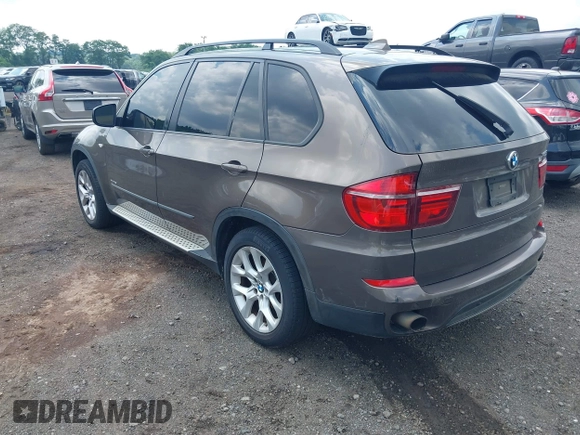 2012 BMW X5 35i with VIN 5UXZV4C59CL766849, listed as a IAAI auction lot 42749836 with 179,273 mi miles and . Bid and sale history available at DreamBid. Image 3.