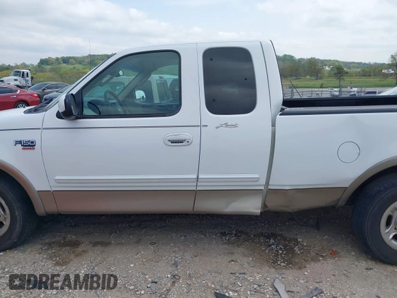 2003 Ford F-150 XL with VIN 1FTRX17L33NB79733, listed as a IAAI auction lot 42023385 with 136,236 mi miles. Bid and sale history available at carsss.com. Image 14.
