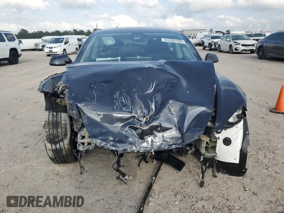 2024 Tesla Model 3 with VIN 5YJ3E1EA5RF741345, listed as a Copart auction lot 51535165 with 7,372 mi miles and Salvage Title. Bid and sale history available at DreamBid. Image 5.