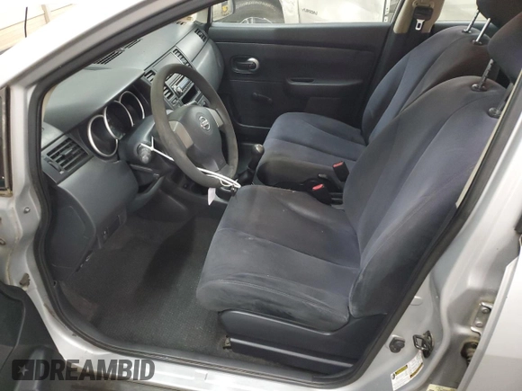 2009 Nissan Versa 1.6 with VIN 3N1CC11E49L422408, listed as a Copart auction lot 55093745 with 169,189 mi miles and Salvage title. Bid and sale history available at DreamBid. Image 7.