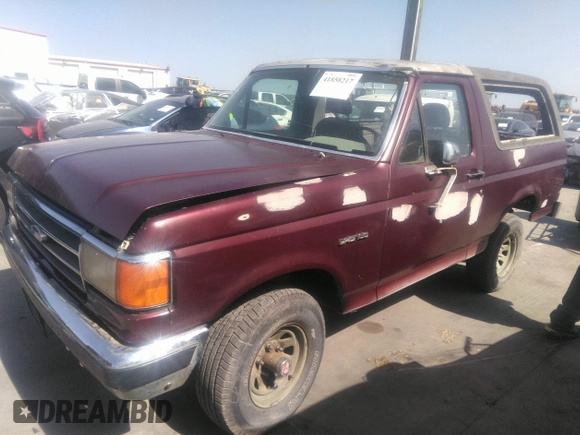 1990 Ford Bronco XL z VIN 1FMEU15N7LLA25223, wystawiony jako IAAI lot #41858217 z przebiegiem 196 000 mil mil oraz . Historia ofert i sprzedaży dostępna na DreamBid. Obrazek 2.