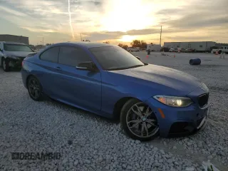 2015 BMW 2 Series M235i with VIN WBA1J7C59FV359017, listed as a Copart auction lot 82226554 with 87,881 mi miles and Salvage Title. Bid and sale history available at carsss.com. Image 4.