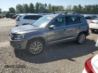 2012 Volkswagen Tiguan SE with VIN WVGAV7AX4CW000428, listed as a Copart auction lot 61707335 with 236,741 mi miles and Salvage title. Bid and sale history available at DreamBid. Image 1.