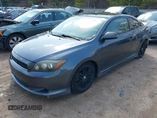 2008 Scion tC Spec with VIN JTKDE167780273485, listed as a IAAI auction lot 41918609 with 167,929 mi miles. Bid and sale history available at carsss.com. Image 2.