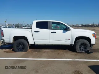 2021 GMC Canyon 4WD AT4 with VIN 1GTG6FEN8M1217042, listed as a IAAI auction lot 41871753 with 65,368 mi miles and . Bid and sale history available at carsss.com. Image 13.