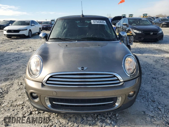 2011 MINI Convertible with VIN WMWZN3C53BT133576, listed as a Copart auction lot 87543835 with 69,999 mi miles and Salvage title. Bid and sale history available at DreamBid. Image 5.