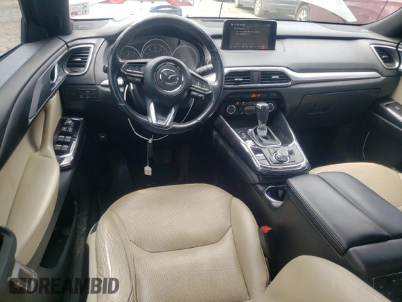 2018 Mazda CX-9 Grand Touring с VIN JM3TCADY9J0205299, выставлен на аукционе Copart как лот 60306095 с пробегом 113 766 миль миль и Списание • Salvage title. История ставок и продаж доступна на DreamBid. Изображение 8.