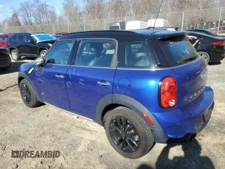 2016 MINI Countryman S with VIN WMWZC5C56GWP49392, listed as a Copart auction lot 50414005 with 90,472 mi miles and Salvage Title. Bid and sale history available at DreamBid. Image 2.