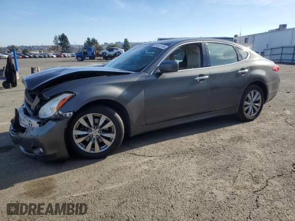 2012 Infiniti M37 with VIN JN1BY1AP8CM333839, listed as a Copart auction lot 84052134 with 121,979 mi miles and Salvage Title. Bid and sale history available at carsss.com. Image 1.