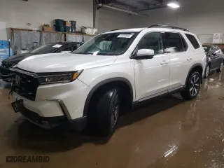 2023 Honda Pilot Elite with VIN 5FNYG1H89PB005675, listed as a Copart auction lot 44009895 with 35,514 mi miles and Salvage Title. Bid and sale history available at carsss.com. Image 1.
