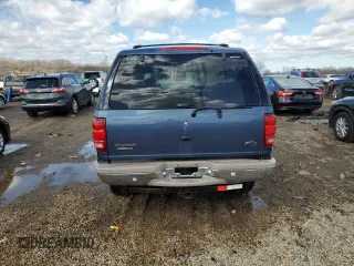 1999 Ford Expedition XLT z VIN 1FMPU18L5XLB51556, wystawiony jako Copart lot #49698855 z przebiegiem 194 898 mil mil oraz Szkoda całkowita • Salvage title. Historia ofert i sprzedaży dostępna na DreamBid. Obrazek 6.