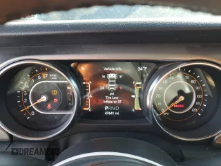 2021 Jeep Wrangler Unlimited Willys Sport with VIN 1C4HJXDG2MW569922, listed as a Copart auction lot 44619615 with 47,641 mi miles and Salvage title. Bid and sale history available at DreamBid. Image 9.