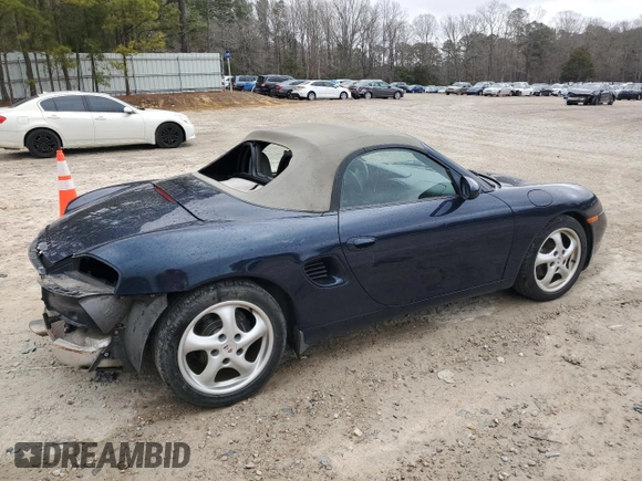 2000 Porsche Boxster z VIN WP0CA2987YU623473, wystawiony jako Copart lot #46845945 z przebiegiem 72 104 mil mil oraz Szkoda całkowita • Salvage title. Historia ofert i sprzedaży dostępna na DreamBid. Obrazek 3.