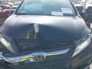2019 Honda Odyssey Elite with VIN 5FNRL6H92KB089949, listed as a IAAI auction lot 42217646 with 61,193 mi miles and . Bid and sale history available at DreamBid. Image 12.