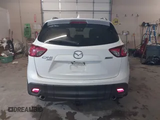 2013 Mazda CX-5 Grand Touring with VIN JM3KE4DE8D0147851, listed as a IAAI auction lot 41570695 with 94,648 mi miles. Bid and sale history available at carsss.com. Image 16.