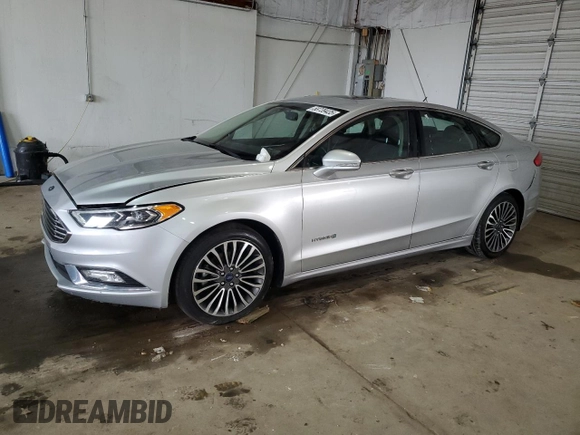 2017 Ford Fusion Hybrid Titanium with VIN 3FA6P0RU4HR223512, listed as a Copart auction lot 58739435 with 174,604 mi miles and Clean title. Bid and sale history available at DreamBid. Image 1.