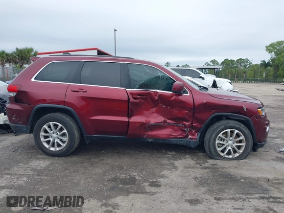 2022 Jeep Grand Cherokee Laredo X with VIN 1C4RJEAG0NC128094, listed as a IAAI auction lot 41402308 with 34,190 mi miles and . Bid and sale history available at DreamBid. Image 13.