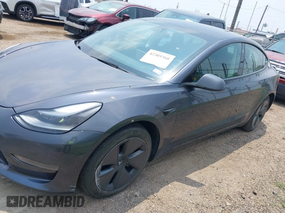 2023 Tesla Model 3 with VIN 5YJ3E1EA7PF409243, listed as a IAAI auction lot 42305360 with Not provided miles and . Bid and sale history available at DreamBid. Image 14.