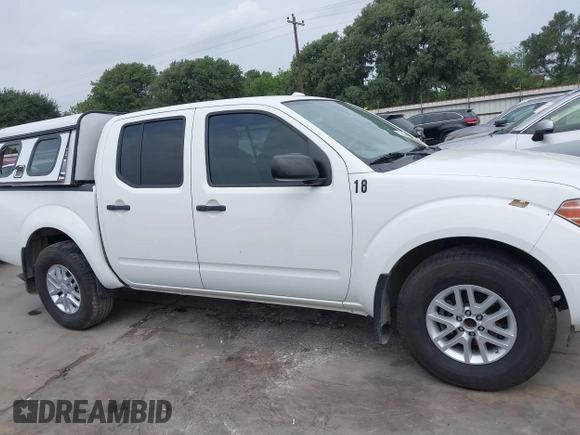 2018 Nissan Frontier SV with VIN 1N6AD0ER9JN714050, listed as a IAAI auction lot 42271759 with 179,596 mi miles and . Bid and sale history available at DreamBid. Image 14.