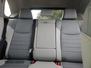2023 Toyota RAV4 Hybrid XLE Premium z VIN JTMB6RFV8PD115723, wystawiony jako Copart lot #88005175 z przebiegiem 18 363 mil mil oraz Szkoda całkowita • Salvage title. Historia ofert i sprzedaży dostępna na DreamBid. Obrazek 10.