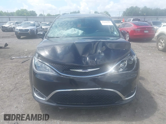 2020 Chrysler Pacifica Touring L with VIN 2C4RC1BGXLR274315, listed as a IAAI auction lot 42608504 with 109,371 mi miles and . Bid and sale history available at DreamBid. Image 12.