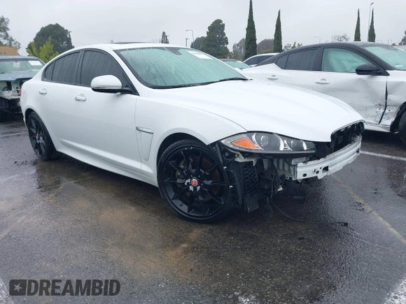 2015 Jaguar XF V6 Portfolio with VIN SAJWA0F70F8U62534, listed as a IAAI auction lot 41521097 with 112,117 mi miles. Bid and sale history available at carsss.com. Image 1.