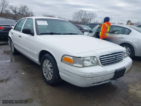 2005 Ford Crown Victoria LX with VIN 2FAFP74WX5X105415, listed as a IAAI auction lot 41523383 with 119,222 mi miles. Bid and sale history available at carsss.com. Image 1.