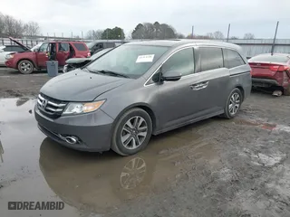 2014 Honda Odyssey Touring with VIN 5FNRL5H94EB001076, listed as a IAAI auction lot 41314546 with NaN miles. Bid and sale history available at carsss.com. Image 17.