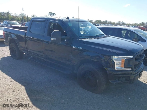 2020 Ford F-150 XL with VIN 1FTFW1E48LKE21404, listed as a IAAI auction lot 41761650 with 140,648 mi miles. Bid and sale history available at carsss.com. Image 1.