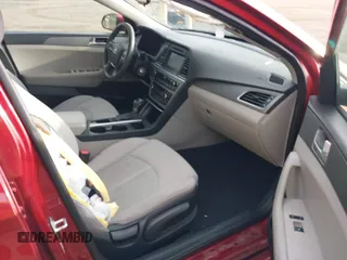 2016 Hyundai Sonata SE with VIN 5NPE24AF0GH261359, listed as a IAAI auction lot 42005720 with 100,889 mi miles and . Bid and sale history available at carsss.com. Image 5.