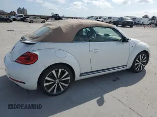 2014 Volkswagen Beetle with VIN 3VW7S7AT5EM815435, listed as a Copart auction lot 43213645 with 109,082 mi miles and Salvage Title. Bid and sale history available at DreamBid. Image 3.