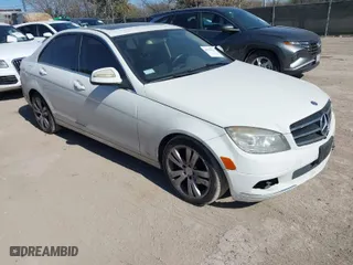 2009 Mercedes-Benz C-Class 3.0L Sport with VIN WDDGF54X79R044951, listed as a IAAI auction lot 41727957 with 1 mi miles. Bid and sale history available at carsss.com. Image 1.