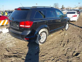 2013 Dodge Journey SXT with VIN 3C4PDCBB3DT564737, listed as a IAAI auction lot 41666723 with 169,486 mi miles. Bid and sale history available at carsss.com. Image 4.